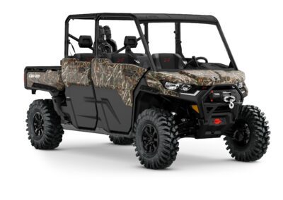 Defender MAX X mr (Xmr) HD10 Model with Half-Doors Shown from the front side in Wildland Camo.